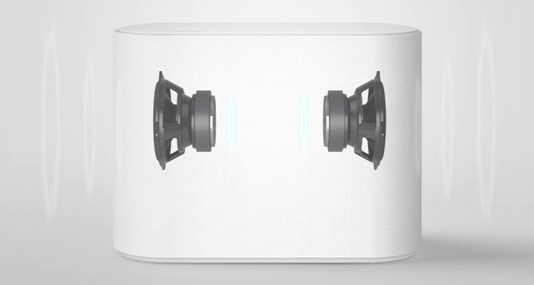 Alibassokaiutin valkoisella lattialla. Alibassokaiuttimen sisäiset osat ovat näkyvissä.