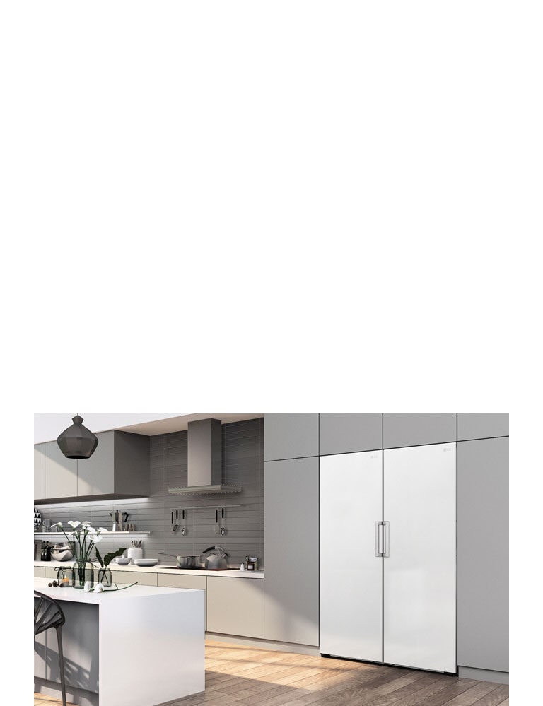 Jääkaappi täydellisesti sulautuneena keittiön kalusteisiin.