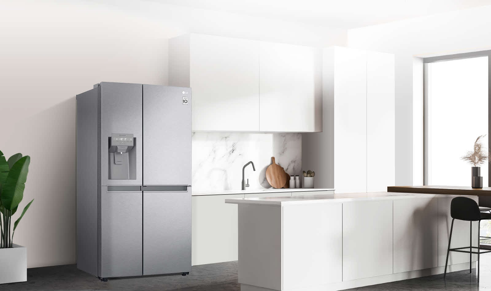 A side view of a kitchen with a black InstaView refrigerator installed.