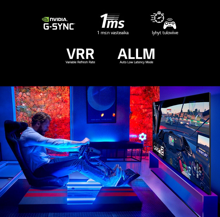 Man in a dark room sitting on a racing game seat in front of a large TV and immersing himself into a racing game 
