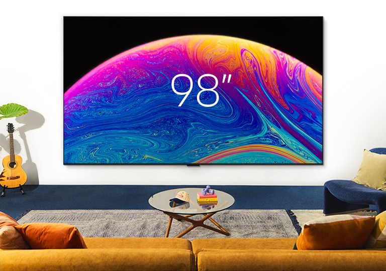 Seinälle asennettu 65 tuuman LG TV suurenee asteittain 75, 86 ja 98 tuuman kokoiseksi.