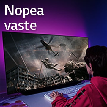 Tyttö pelaa tietokonepeliä, suurella TV-näytöllä näkyy sotilas, joka laskeutuu alas helikopterista.