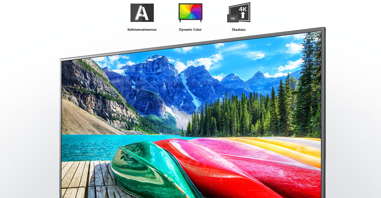 Kohinanvaimennuksen, dynaamisten värien ja skaalauksen kuvakkeet sekä TV-ruutu, jossa näkyy luonnonkaunis kuva vuorista, metsästä ja järvestä.