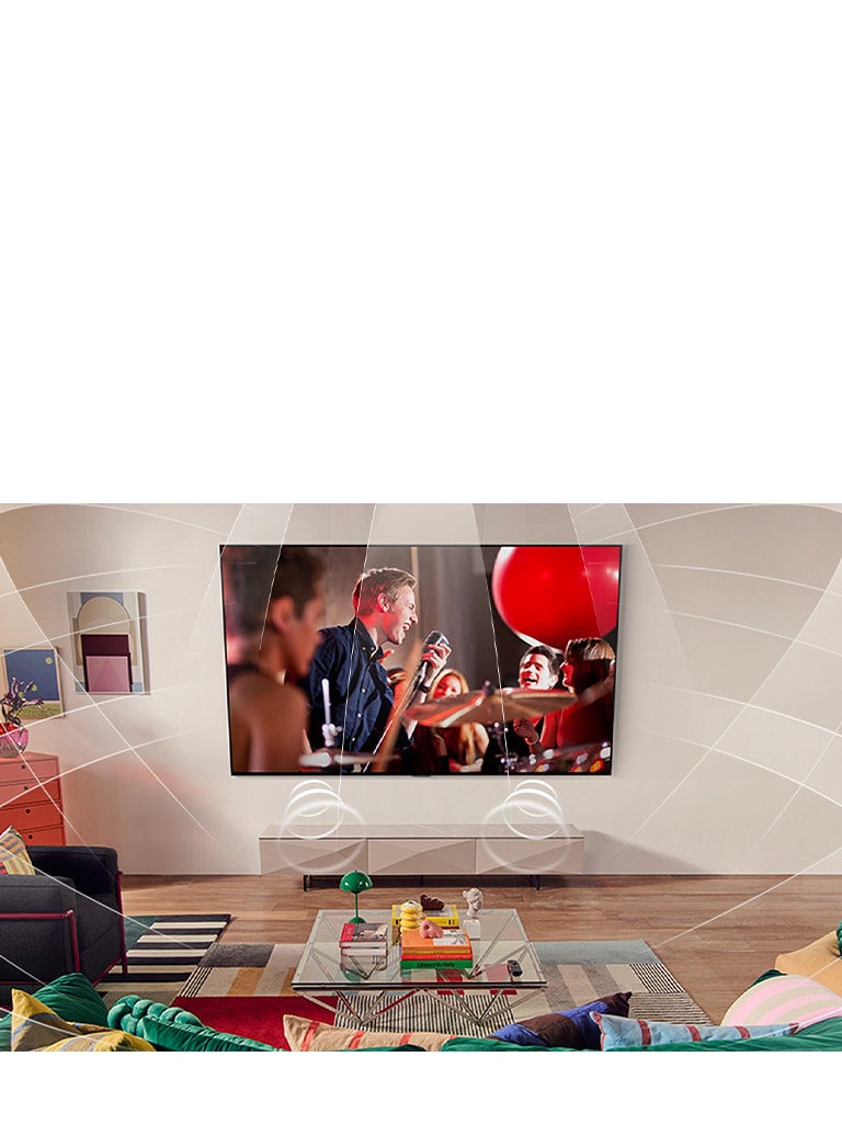 Olohuone, jossa on seinälle asennettu LG TV. Ääniaallot näytetään graafisina täyttämässä tilaa ja ne osoittavat, miten 11.1.2.-kanavat luovat surround-äänikokemuksen käyttäjälle. 