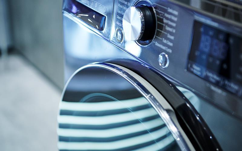 A close-up image of lg washing machine ai dd turbowash 360 at ifa 2019 in berlin.