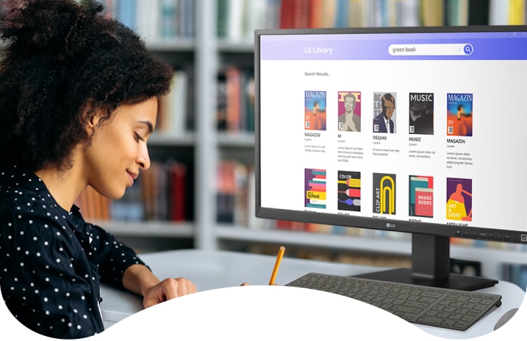 A student is searching for books using the LG 27-inch Full HD All-in-One Thin Client. The fanless design increases the LG Thin Client's lifespan and also reduces replacement costs. The low noise and heat provide a pleasant office environment, and the lower power consumption reduces management costs.