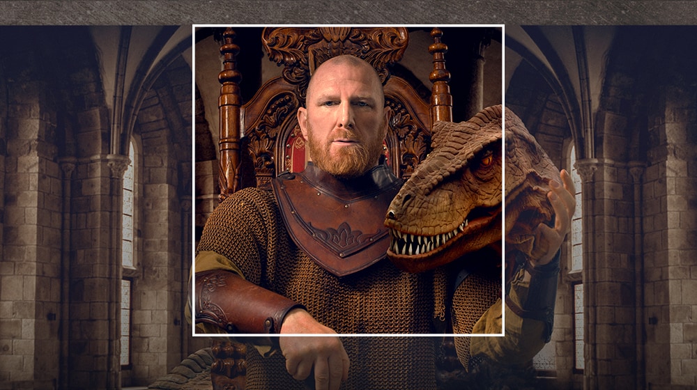 An image of a man sitting in a chair. A square overlay is applied on top of the man representing AI Super Upscaling, bringing him into sharp focus against an artfully blurred background.