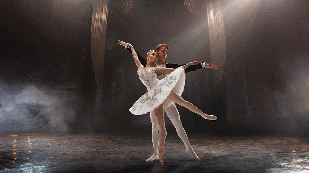 A video of the ballet performance by a male and female couple on the stage. A grid overlay covers only the couple, making them stand out against the dark background.
