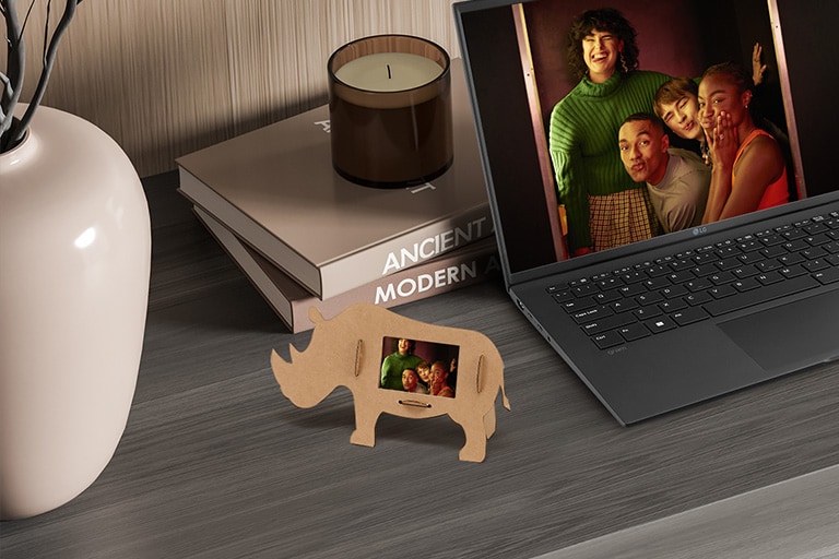 It shows the rhino piacture frame displayed on the desk.