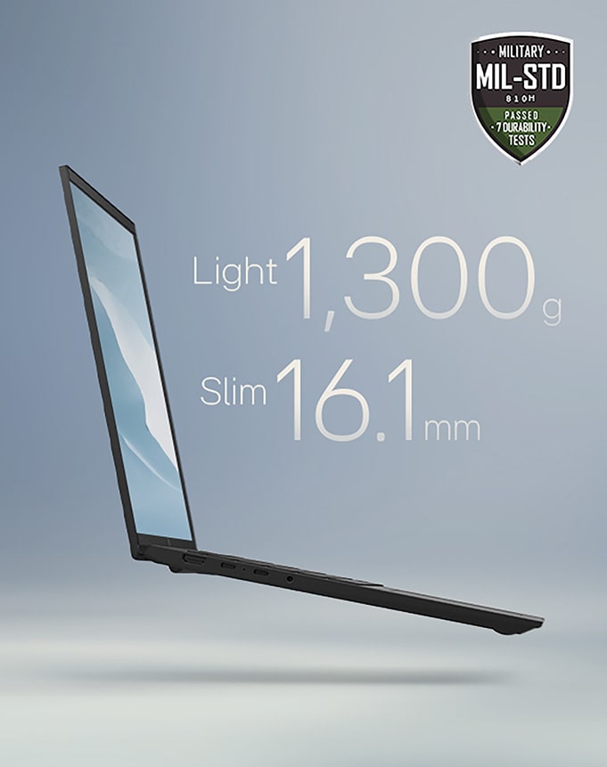 The image showcases a slim laptop with the text: "Light, thin, all-powerful" at the top. Key specifications, "Light 1,239 g" and "Slim 15.7 mm," are highlighted in the center. A MIL-STD durability badge is displayed in the upper-right corner, emphasizing its robustness.	