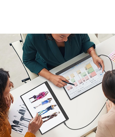 Two LG gram +views are being used for work. One screen displays a schedule, while the other shows fashion illustrations. The dual display helps with multitasking.	