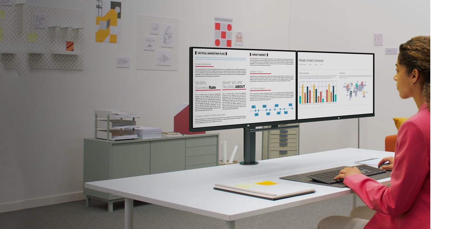 Scene of office worker with Ergo Dual monitor