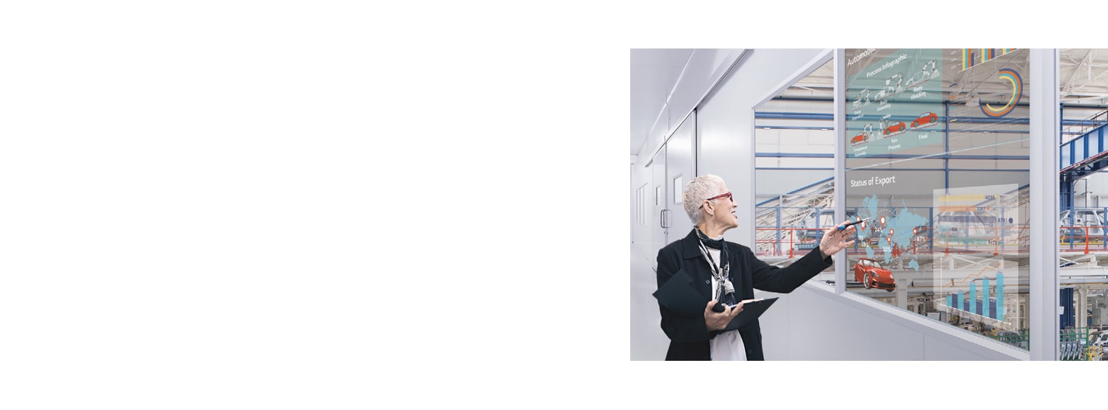 A woman understands her work by looking at the transparent display installed in the office's windows.