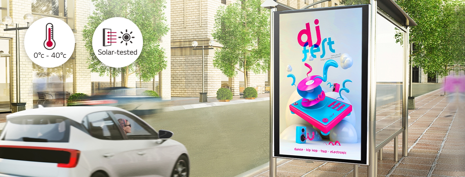 A woman in a car is looking at a DOOH (Digital Out Of Home media) ad on the side of the road. Via a solar test conducted inside LG, this product can operate at wide range of temperature of 0 to 40 degrees.