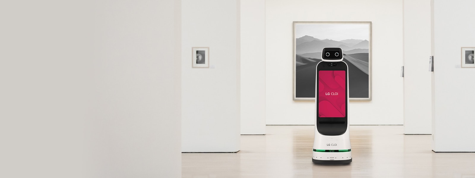 lg cloi guidebot is moving in the department store and providing services.