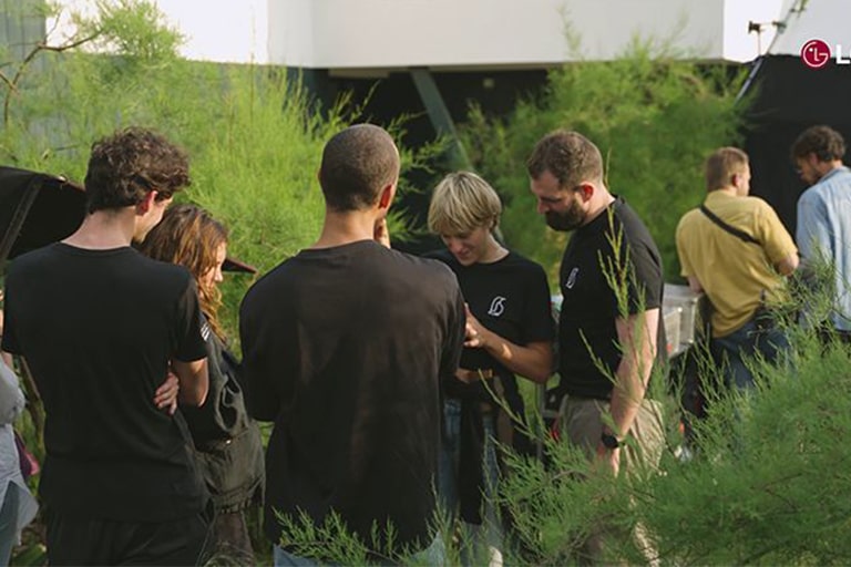 People gathered in the grass