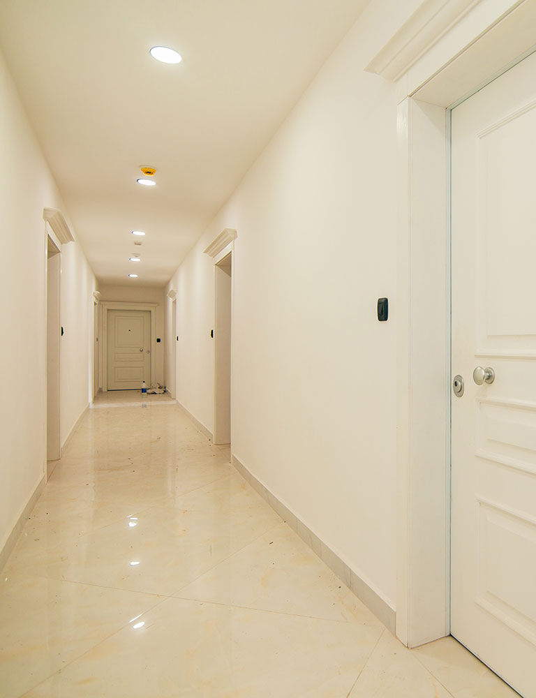 Groceries and essentials delivery through synchronized operation with elevators and automatic doors.