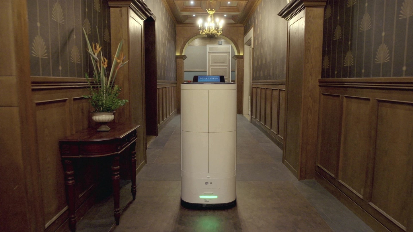 Image of LG CLOi walking through a hotel lobby	