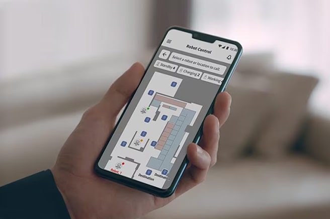a user is monitoring the status of lg cloi servebot easily by mobile.	