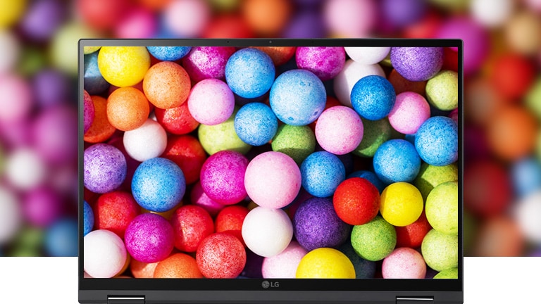 It shows the DCI-P3 99% (Typ.) wide color gamut with vivid and colorful balls on the screen.