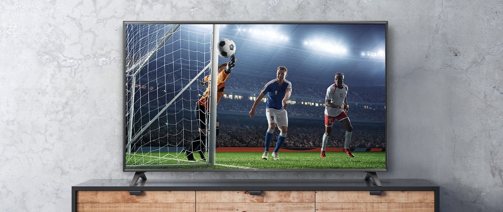 The soccer game scene shown on the TV screen appears real.