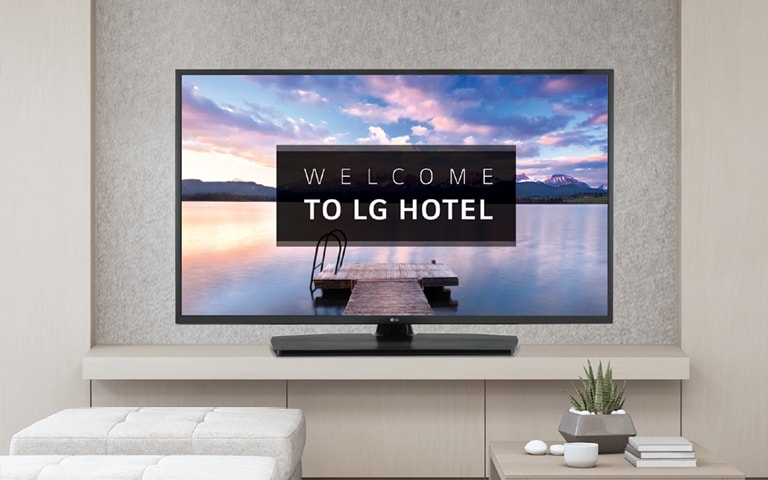 A TV is screening greeting messages with images.