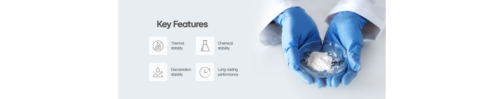 A gloved hand holds a petri dish containing a material, highlighting its four key features