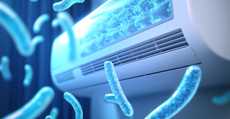 An airconditioner surrounded by blue bacteria-like substances glowing in blue.