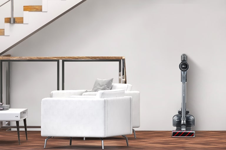 There's a vacuum cleaner in the living room.