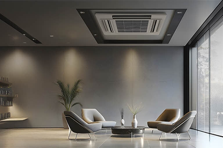 Minimalist lounge area with an ceiling cassette air conditioner embedded in the ceiling, offering discreet and even airflow in a spacious commercial-like setting.