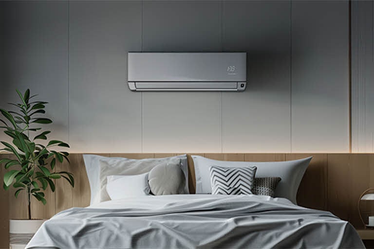 Contemporary bedroom featuring an wall-mounted air conditioner above the bed, providing quiet and efficient cooling in a cozy, natural-toned space.