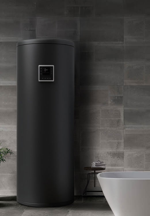 Matte black cylindrical Air to Water Heat Pump installed indoors against a tiled wall, next to a modern white bathtub.