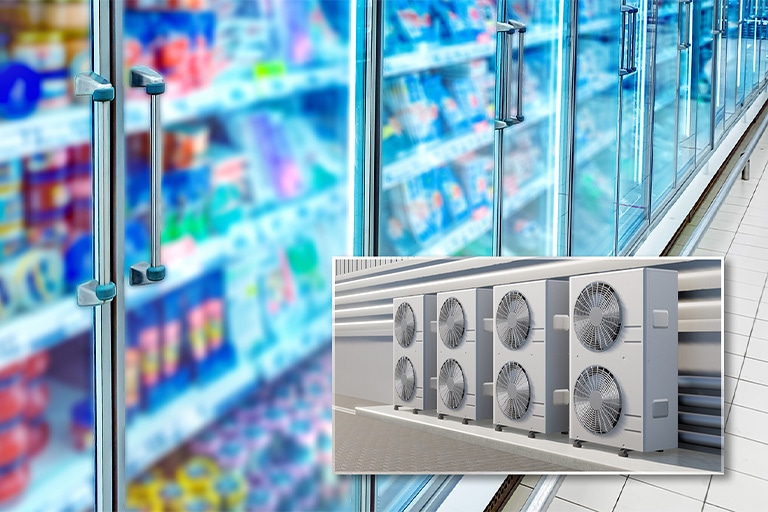 Close-up of commercial freezer display cases filled with frozen goods, accompanied by an outdoor LG refrigeration unit with multiple condenser fans for efficient cooling performance.