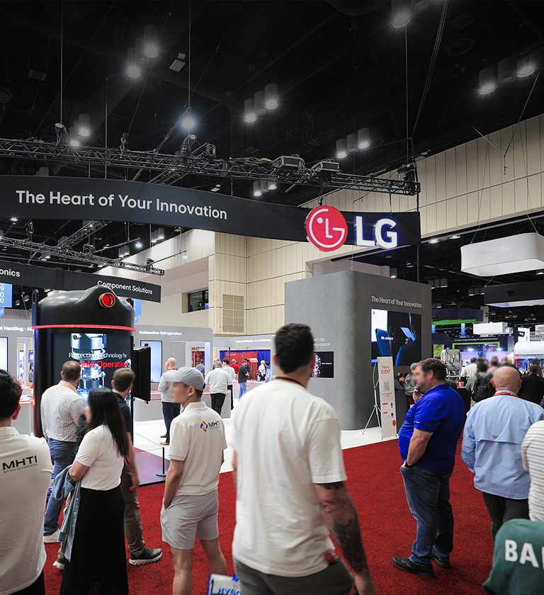 On-site image in front of the LG booth at AHR 2025 with many visitors