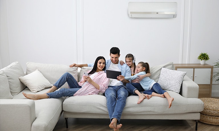 A Family Enjoying the Air Conditioning