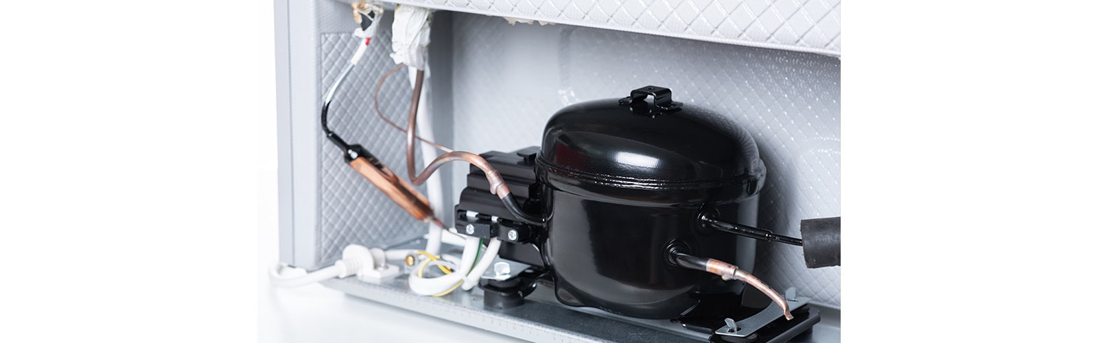 A reciprocating compressor installed in a refrigerator