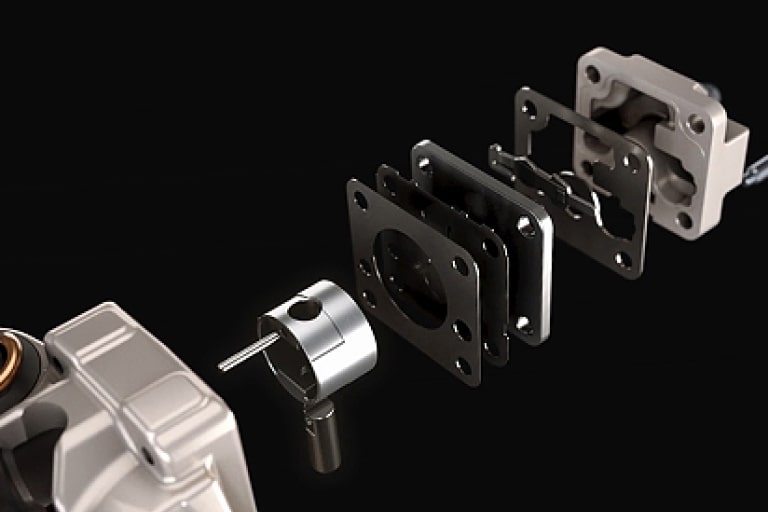 The internal components of the reciprocating compressor are shown disassembled.