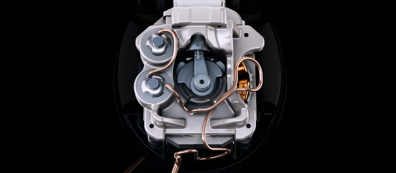 Top view of an LG variable speed reciprocating compressor's internal mechanism within a metallic housing on a dark background.