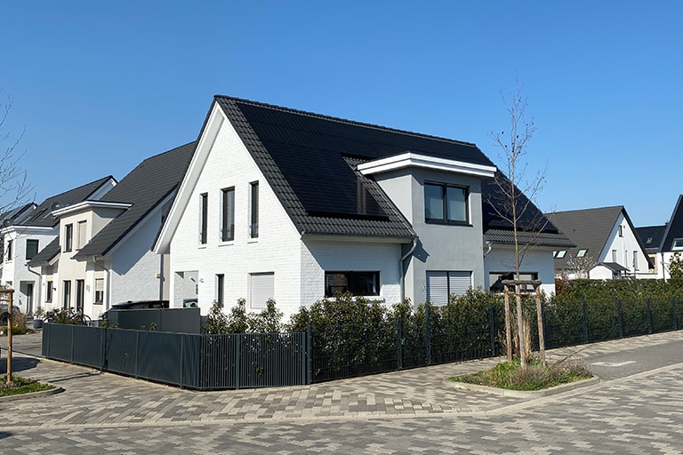 A wide shot of a large house.