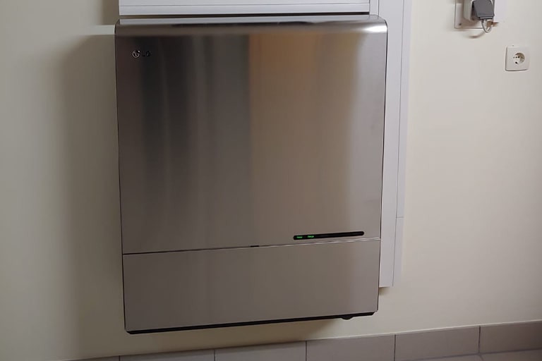 A residential LG ESS unit on a wall.