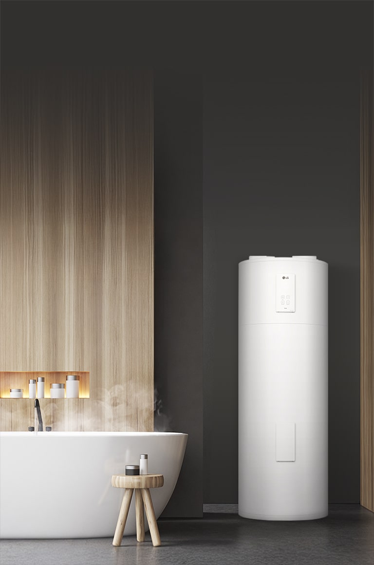 LG Heat Pump Water Heater installed in a modern bathroom next to a steaming bathtub.