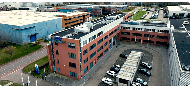 ERIKS office building Netherlands aerial view rooftop HVAC units parking corporate headquarters commercial complex