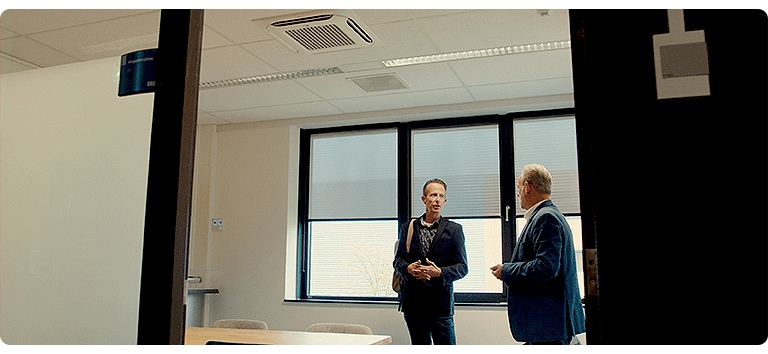 Modern office meeting room Netherlands professionals workplace air conditioning blinds corporate space natural light