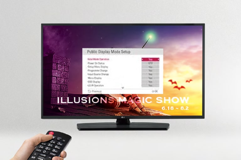 A person is controlling the TV settings with Public Display Mode. 