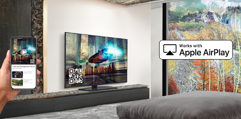 A hotel guest is pairing their iPhone with the in-room TV through AirPlay.