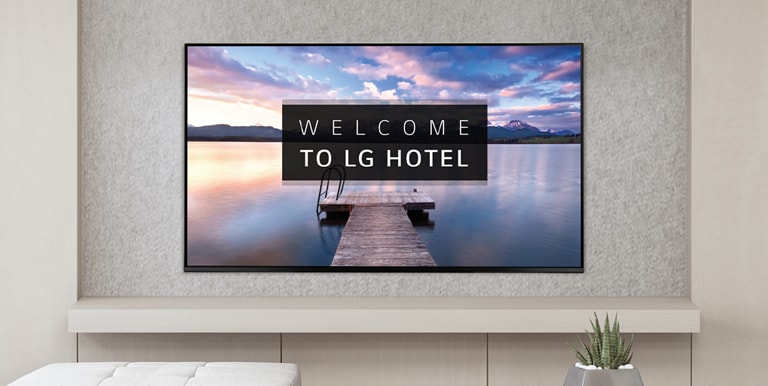 A TV is screening greeting messages with images.