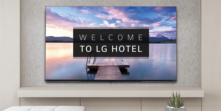 A TV is screening greeting messages with images.