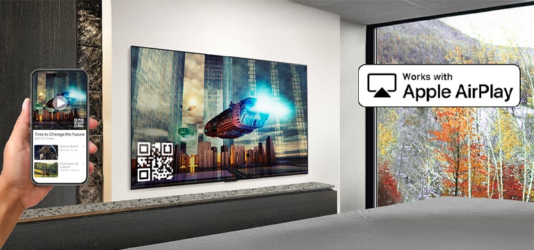 A hotel guest is pairing their iPhone with the in-room TV through AirPlay.