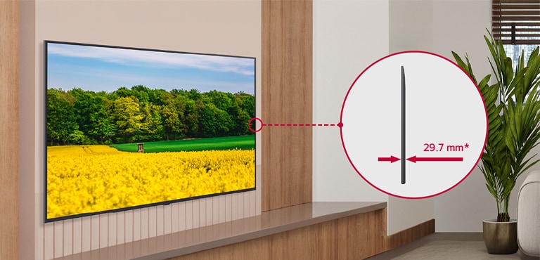 The UK767H is seamlessly installed in the hotel room, and a side view is shown to highlight its slim design.