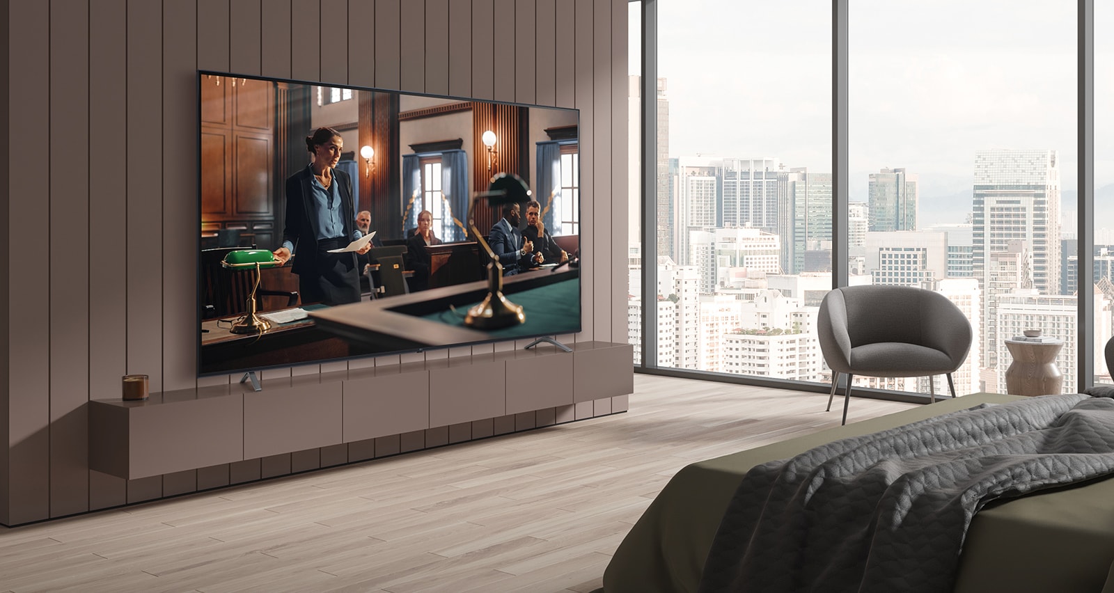 A TV is hanging on the wall of the hotel room, and the TV screen is bright and clear.